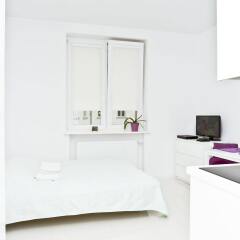 Апартаменты Goodnight Warsaw Apartments Wilcza 26a комната для гостей фото 3