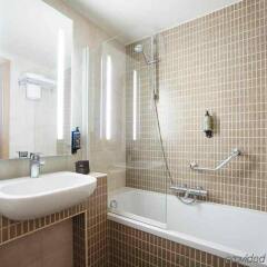 Отель Novotel Brussels Midi Station Брюссель ванная