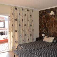 Отель La Aldea Suites сейф в номере