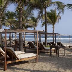 Отель Las Palmas Beachfront Villas Мексика, Коакоюл - отзывы, цены и фото номеров - забронировать отель Las Palmas Beachfront Villas онлайн пляж