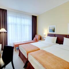 Гостиница Golden Tulip Rosa Khutor (Голден Тюлип Роза Хутор) в Красной Поляне - забронировать гостиницу Golden Tulip Rosa Khutor (Голден Тюлип Роза Хутор), цены и фото номеров Красная Поляна комната для гостей фото 5