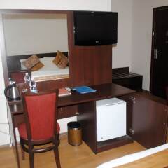 Отель Grand Inn & Suites удобства в номере фото 2