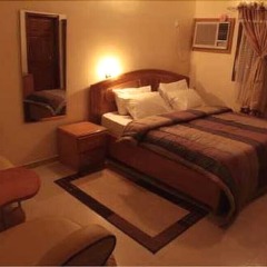 Отель Scholet Suites Калабар комната для гостей