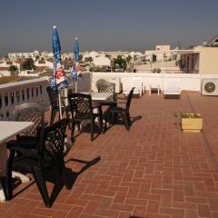 Отель Hostal Cabrera гостиничный бар