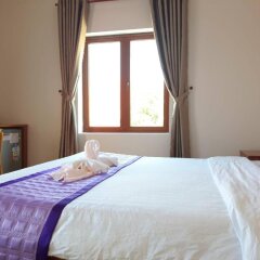 Отель Pink House Homestay Вьетнам, Хойан - отзывы, цены и фото номеров - забронировать отель Pink House Homestay онлайн сейф в номере