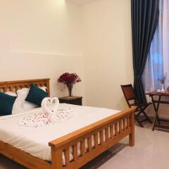 Отель Sum Villa Hoi An комната для гостей