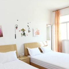 Апартаменты Happiness Apartment Сямынь комната для гостей фото 5