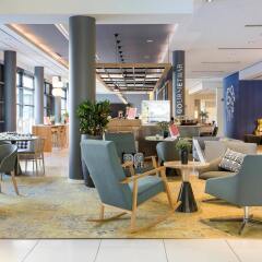 Отель Novotel Muenchen City Германия, Мюнхен - 11 отзывов об отеле, цены и фото номеров - забронировать отель Novotel Muenchen City онлайн интерьер отеля