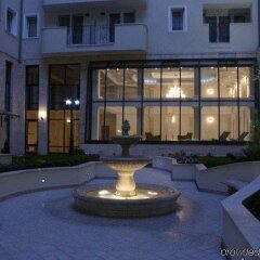 Queen's Court Hotel &Residence фото 9