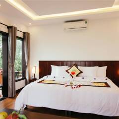Отель Hoi An Golden Rice Villa комната для гостей