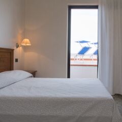 Отель Residence Arcobaleno Италия, Пальми - отзывы, цены и фото номеров - забронировать отель Residence Arcobaleno онлайн комната для гостей фото 2