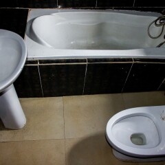 Отель Emglo Suites в номере