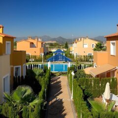 Отель Apartamentos y Villas Oliva Nova Golf Resort Испания, Олива - отзывы, цены и фото номеров - забронировать отель Apartamentos y Villas Oliva Nova Golf Resort онлайн балкон
