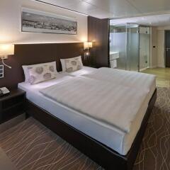 Отель Park Inn by Radisson Berlin Alexanderplatz комната для гостей фото 3