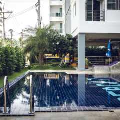 Отель Beach 7 Condo by GrandisVillas Паттайя бассейн фото 2