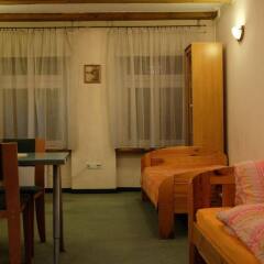 Отель Academus Pub & Apartments Польша, Вроцлав - отзывы, цены и фото номеров - забронировать отель Academus Pub & Apartments онлайн комната для гостей