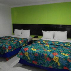 Hotel El Cid Merida комната для гостей