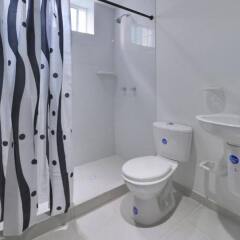Отель Tropical Breeze Apartamentos Колумбия, Сан-Андрес - отзывы, цены и фото номеров - забронировать отель Tropical Breeze Apartamentos онлайн ванная