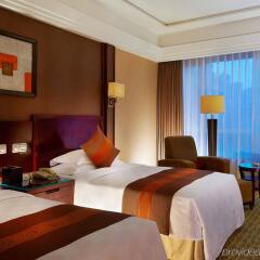 Отель Crowne Plaza City Center Ningbo комната для гостей фото 4