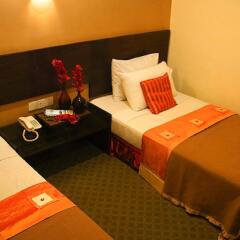 Отель DOriental Inn, Chinatown, Kuala Lumpur Малайзия, Куала-Лумпур - 2 отзыва об отеле, цены и фото номеров - забронировать отель DOriental Inn, Chinatown, Kuala Lumpur онлайн комната для гостей фото 2