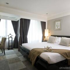 Апартаменты Cape House Serviced Apartments Бангкок комната для гостей фото 4