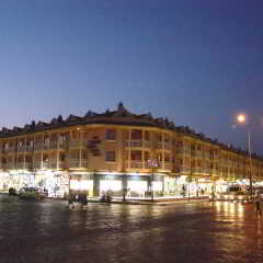Отель Midpoint Club and Suites