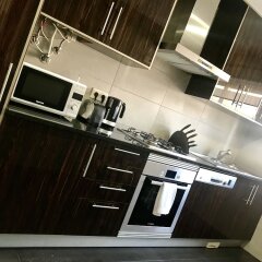 Отель Modern beach view townhouse в номере