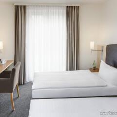 Отель IntercityHotel Wien Австрия, Вена - 3 отзыва об отеле, цены и фото номеров - забронировать отель IntercityHotel Wien онлайн комната для гостей фото 4