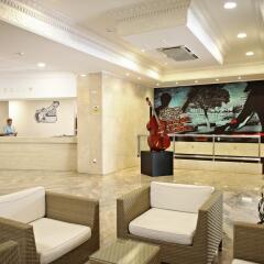 Отель Sandos Benidorm Suites - All Inclusive Испания, Бенидорм - отзывы, цены и фото номеров - забронировать отель Sandos Benidorm Suites - All Inclusive онлайн интерьер отеля