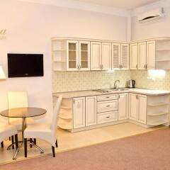 Corona Hotel & Apartments в номере