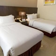 Mandarin Plaza Hotel комната для гостей фото 3
