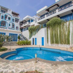 Отель OYO 11899 Home Greek Style 4BHK Penthouse Bambolim Гоа бассейн