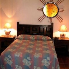 Отель Suites La Siesta Пуэрто-Вальярта в номере