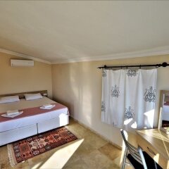 Villa Zumrut 4 by Akdenizvillam Турция, Патара - отзывы, цены и фото номеров - забронировать отель Villa Zumrut 4 by Akdenizvillam онлайн комната для гостей фото 3