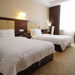 Dong Yi Business Hotel комната для гостей фото 3