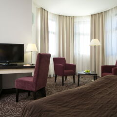 Гостиница AZIMUT Hotel FREESTYLE Rosa Khutor в Эсто-Садке - забронировать гостиницу AZIMUT Hotel FREESTYLE Rosa Khutor, цены и фото номеров Эсто-Садок комната для гостей