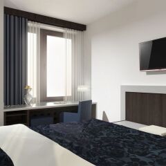 Отель Carathotel Dusseldorf City Дюссельдорф комната для гостей фото 5