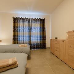 Отель Seafront Luxury Apartment, Pool and Great Location Мальта, Слима - отзывы, цены и фото номеров - забронировать отель Seafront Luxury Apartment, Pool and Great Location онлайн комната для гостей фото 5