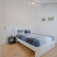 Апартаменты Liiiving - Cosy Downtown Apartments Порту комната для гостей фото 3