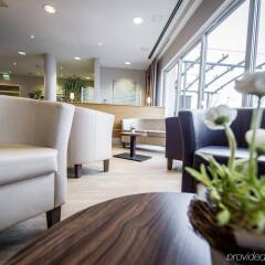 Отель Holiday Inn Express Cologne Mulheim Кёльн интерьер отеля