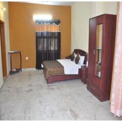 Отель Jypore Saffron Inn & Suites комната для гостей