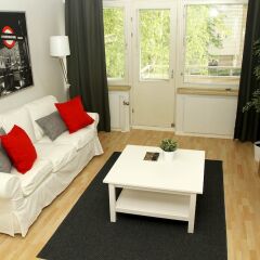 Апартаменты Kotimaailma Apartments Joensuu Йоенсуу комната для гостей фото 5