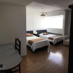 Отель Grupo Kings Suites Magnolia Мехико комната для гостей