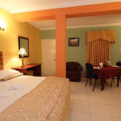 Отель Signature Inn Гайана, Джорджтаун - отзывы, цены и фото номеров - забронировать отель Signature Inn онлайн комната для гостей