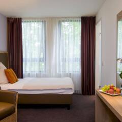 Отель ACHAT Premium Hotel München Süd Германия, Мюнхен - 1 отзыв об отеле, цены и фото номеров - забронировать отель ACHAT Premium Hotel München Süd онлайн комната для гостей фото 5