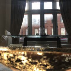 Апартаменты Suitely Trafalgar Square Luxury Apartment Лондон гостиничный бар