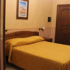 Ninfa Hotel Куальяно комната для гостей