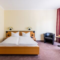 Отель AZIMUT Hotel Dresden Германия, Дрезден - 5 отзывов об отеле, цены и фото номеров - забронировать отель AZIMUT Hotel Dresden онлайн комната для гостей фото 5