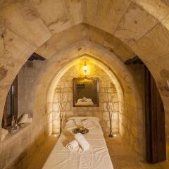 Отель Kayakapi Premium Caves Cappadocia сауна