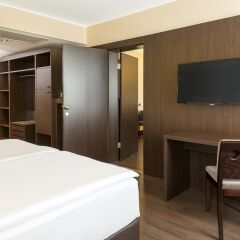 Отель NH Danube City Австрия, Вена - отзывы, цены и фото номеров - забронировать отель NH Danube City онлайн комната для гостей фото 2